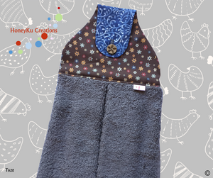 Towel with Button Over Top Tab 620