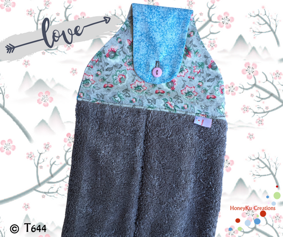 Towel with Button Over Top Tab 644